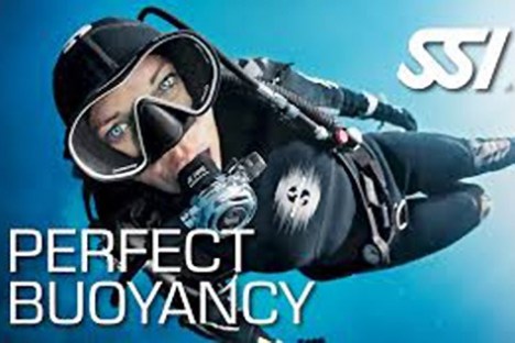 Scuba diver underwater with camera, SSI logo, and 'Perfect Buoyancy' text.