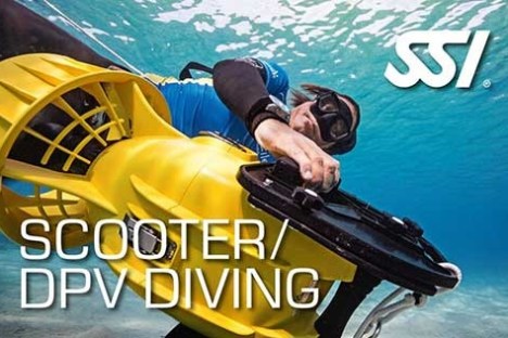 Diver using a yellow scooter underwater with 'Scooter/DPV Diving' text and SSI logo.